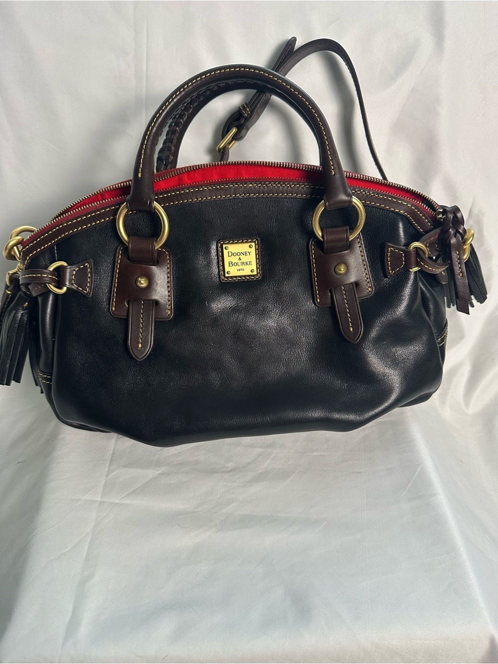 Dooney & Bourke Black Leather Satchel with Red Zip Trim